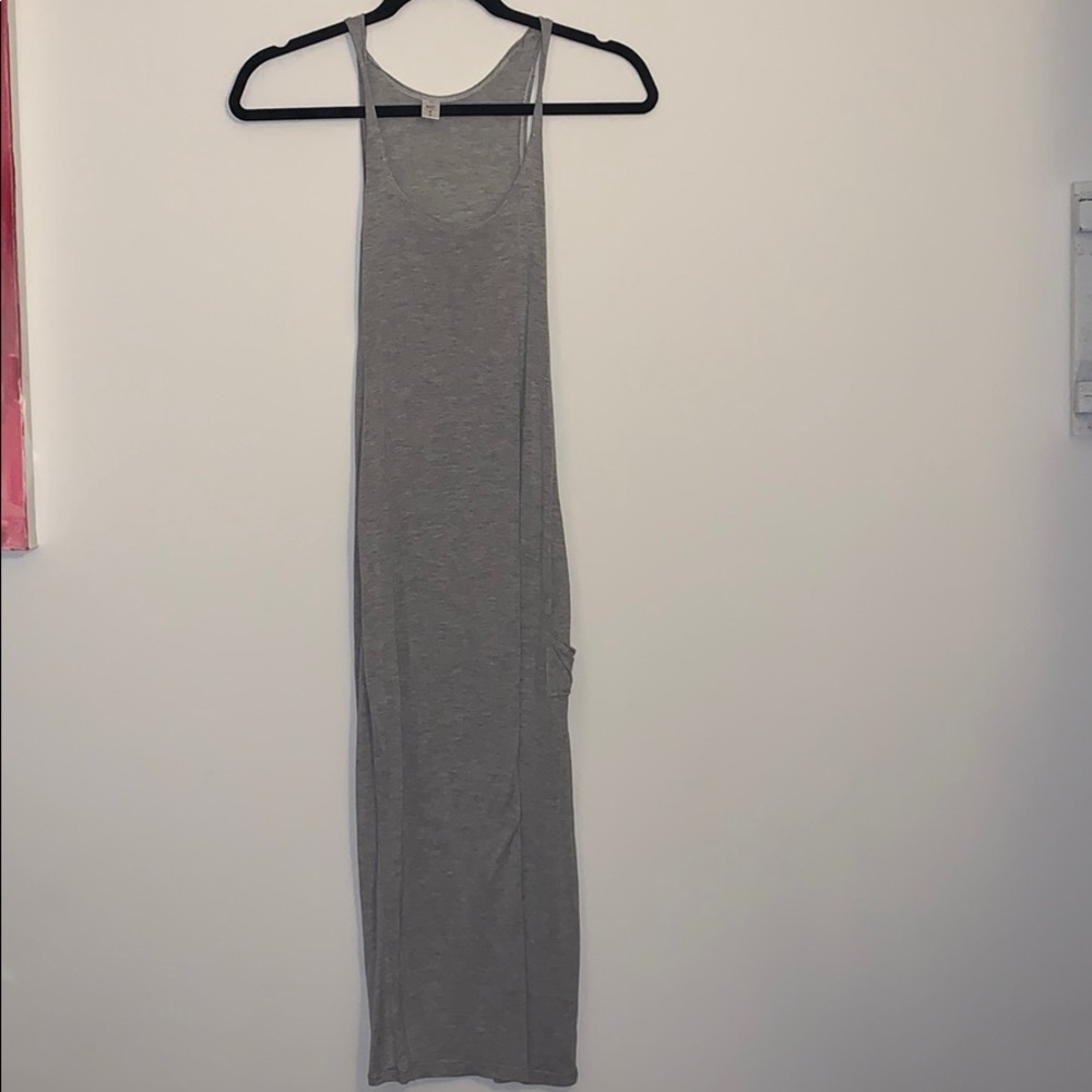 Tight, grey, ankle length dress.